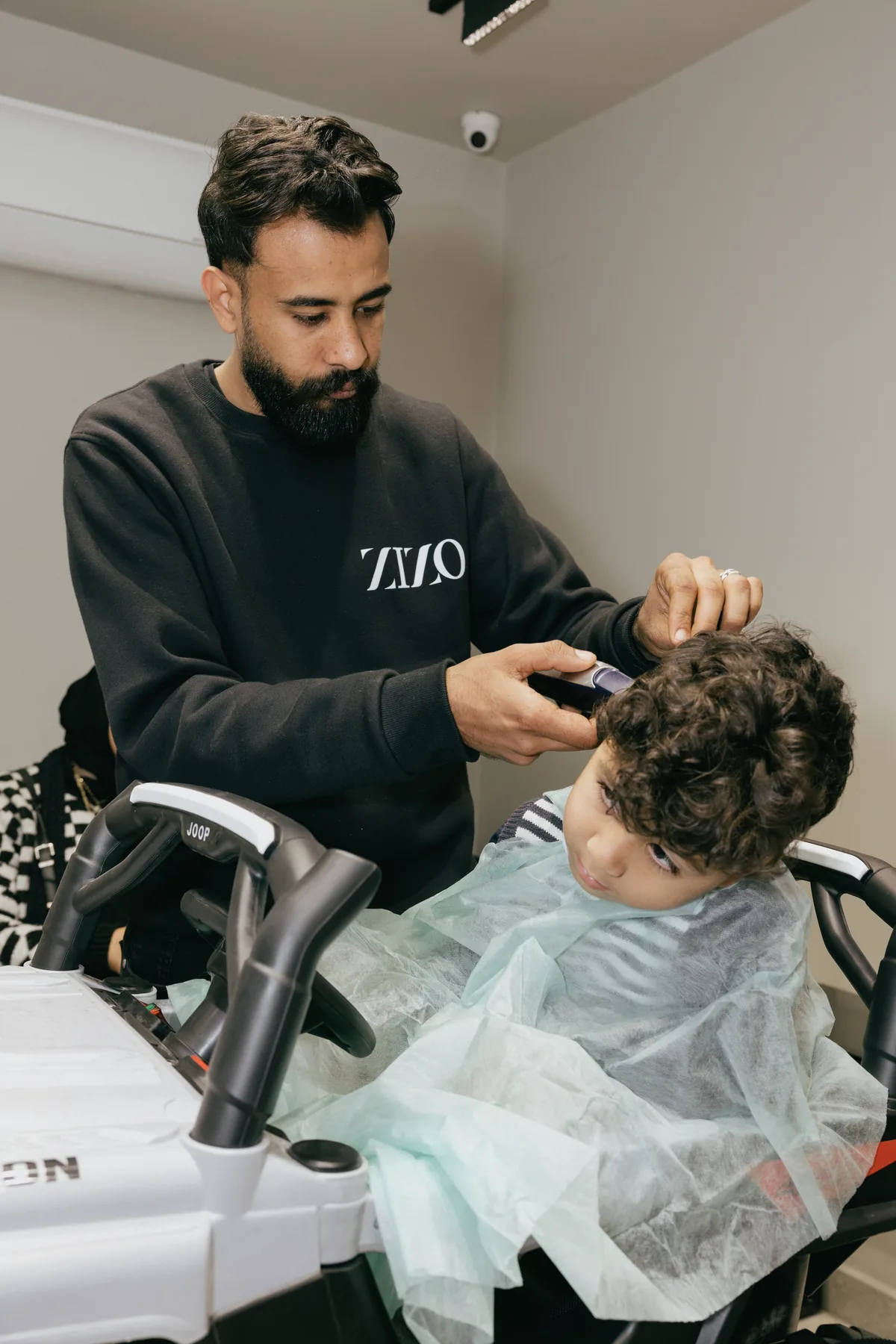A ZIZO barber at work